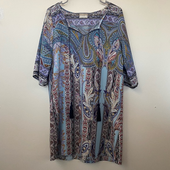 Tua split neck short sleeve blouse with tassels - Picture 1 of 8